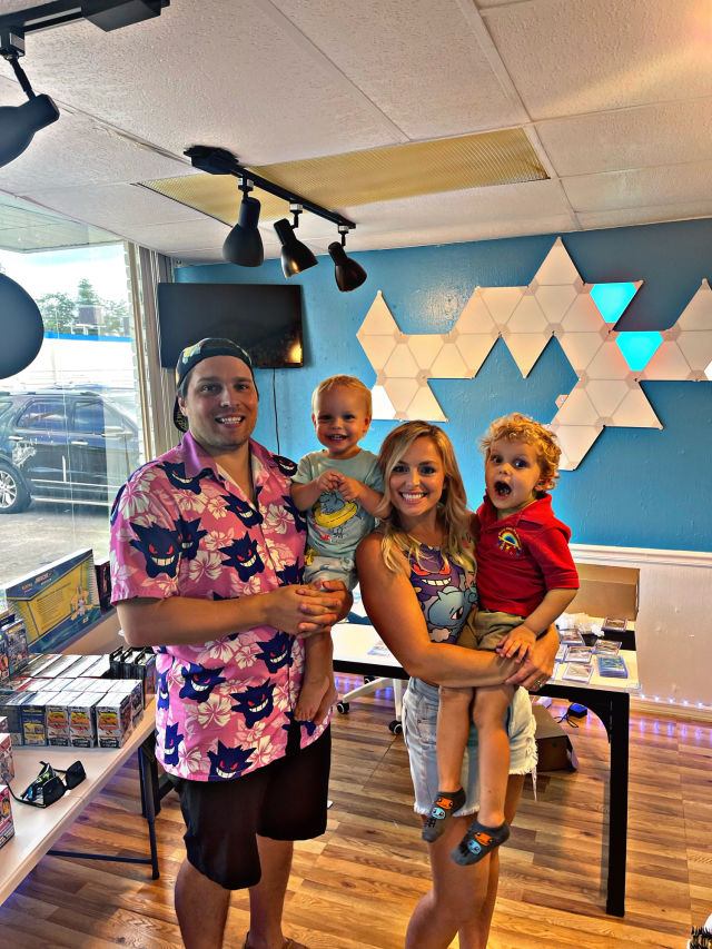 Kirill Lavrentyev and his family at his store, Poke Ballers Mart, in Sarasota.