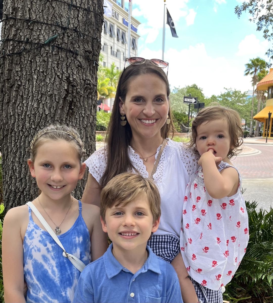 Picture of Lindsay Leary, one of the owners and office manager of Aqua-Tots and her kids