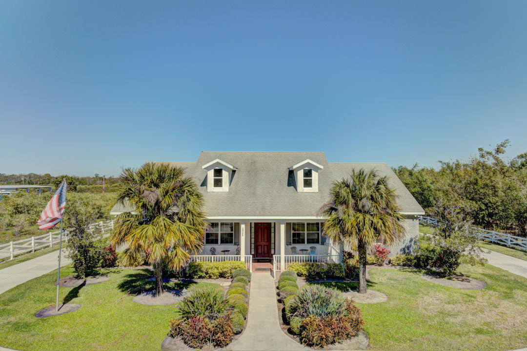 A farmhouse residence on the ground.