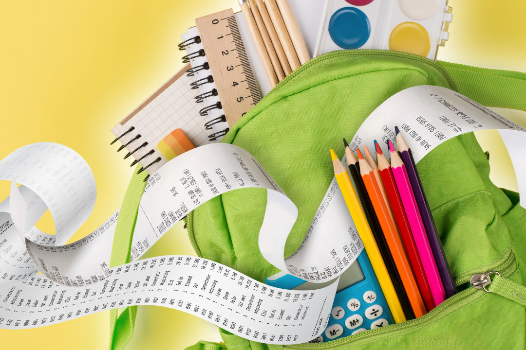 Back to school poster art with colored pencils, rulers, a green backpack, and receipts