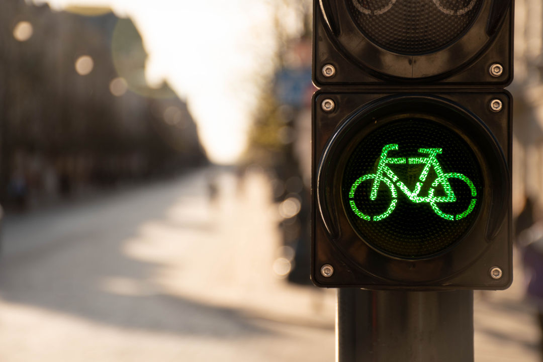 Image of a green light for bikes to cross the street.