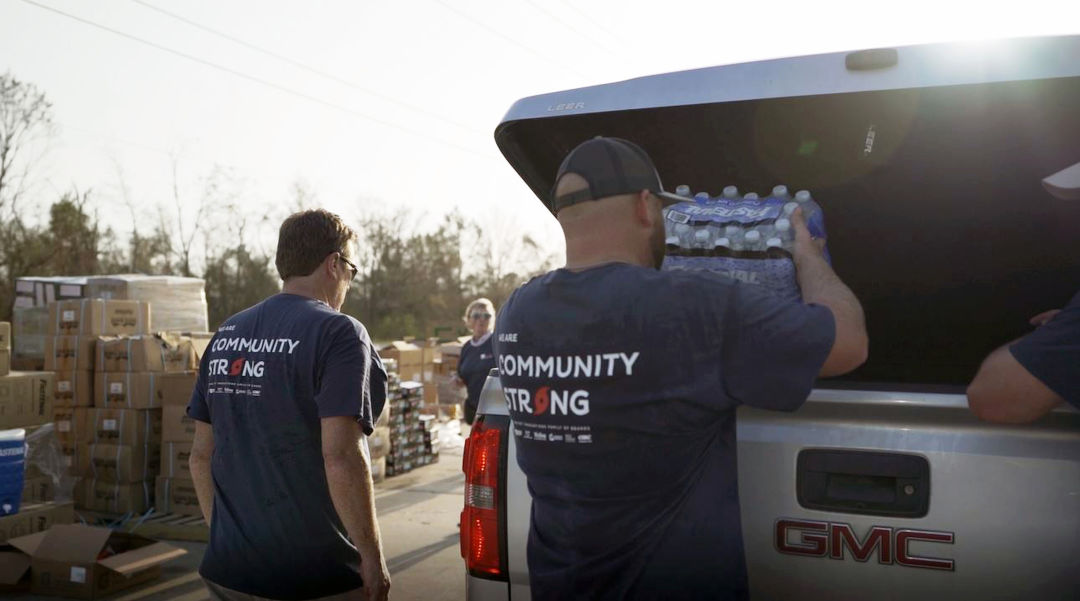 PGT Innovations team members unload relief supplies in Lake Charles, Louisiana, to help those affected by Hurricane Laura.