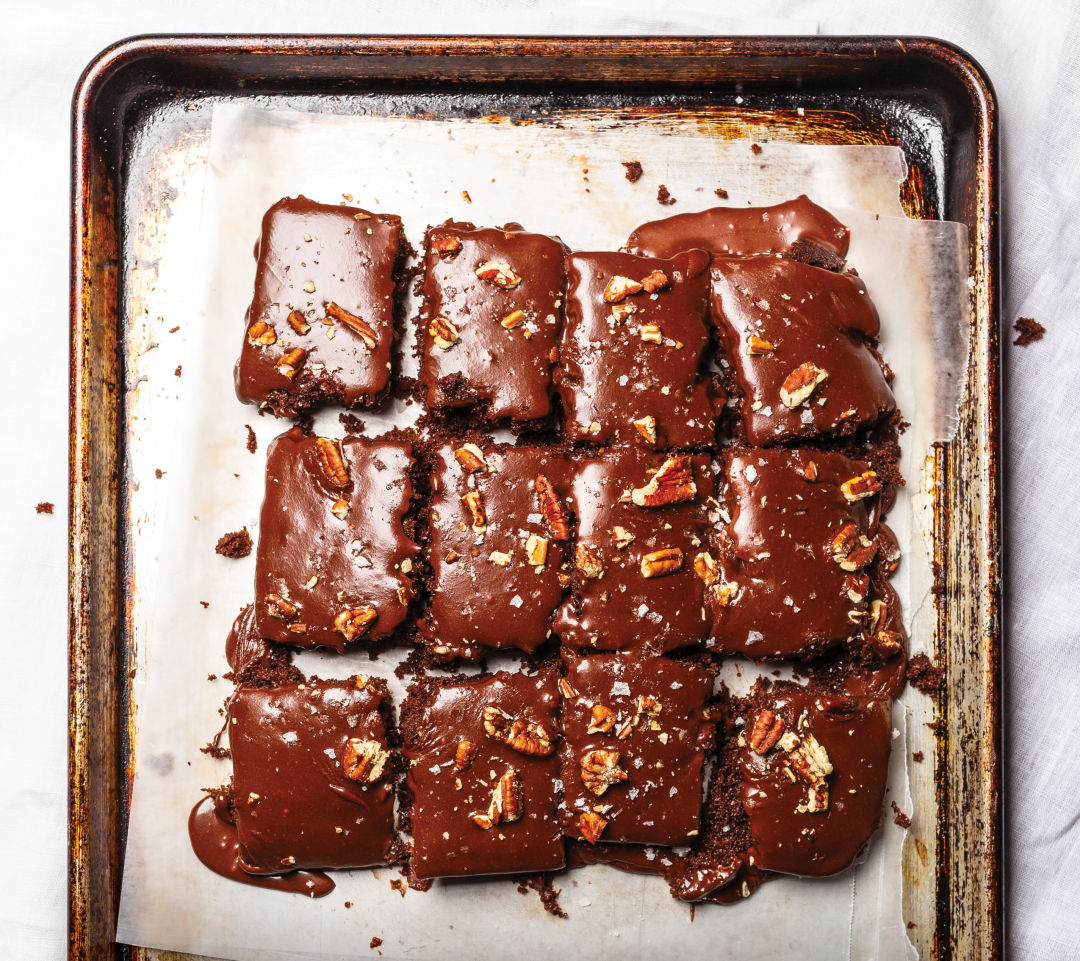 Hush Brownies on white plate with pot leafs and weed buds on jamaican style  background covered by cocoa powder. Healthy THC CBD Cookies from Amsterdam  Stock Photo - Alamy