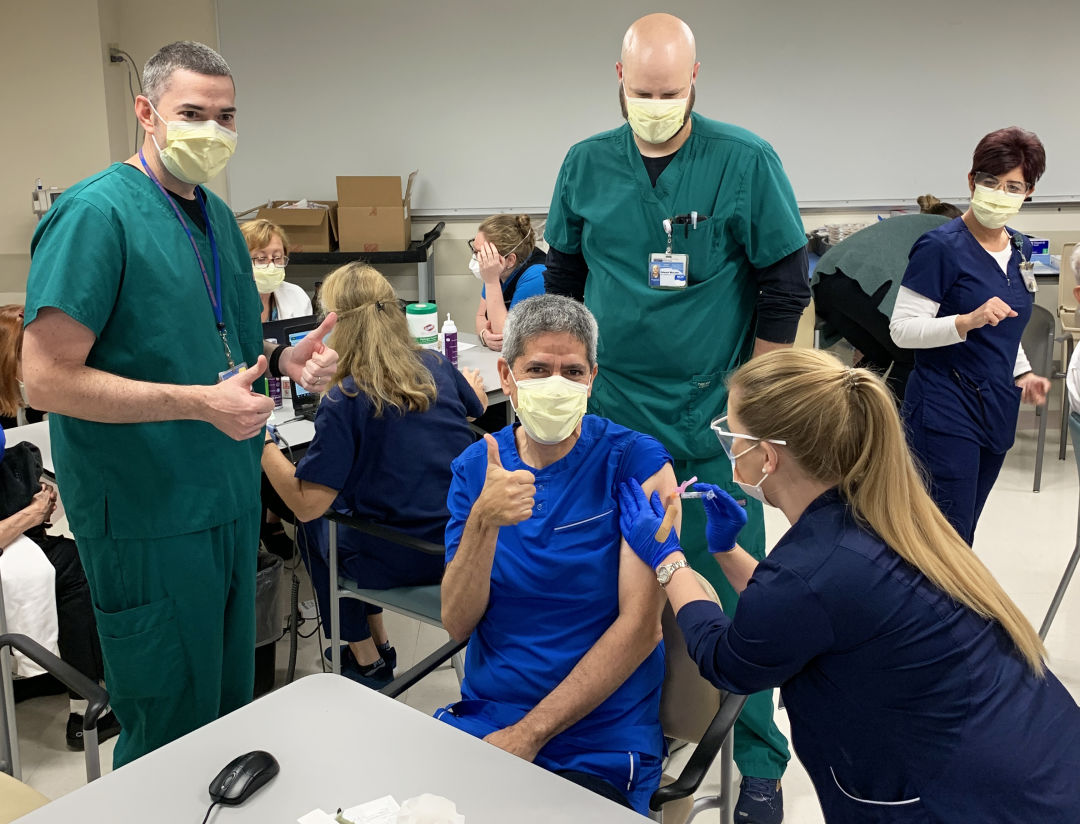 Dr. Manuel Gordillo receives his Covid-19 vaccine earlier this year