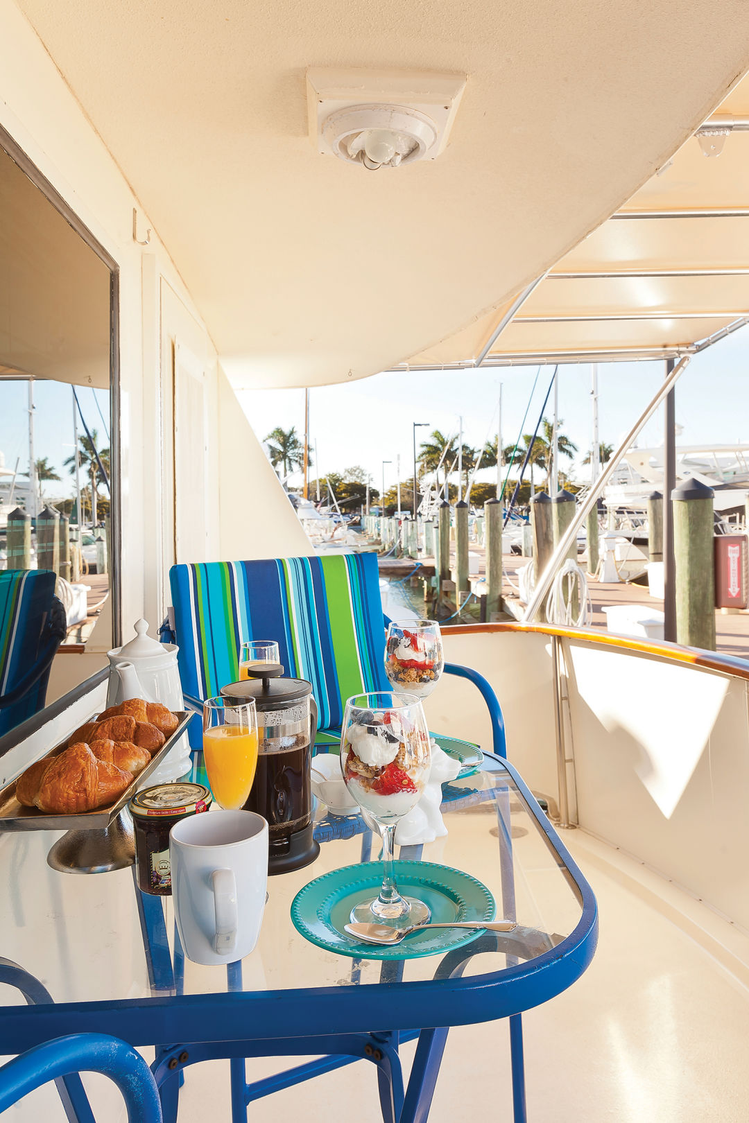 Breakfast on the rear deck of the Lancasters’ yacht