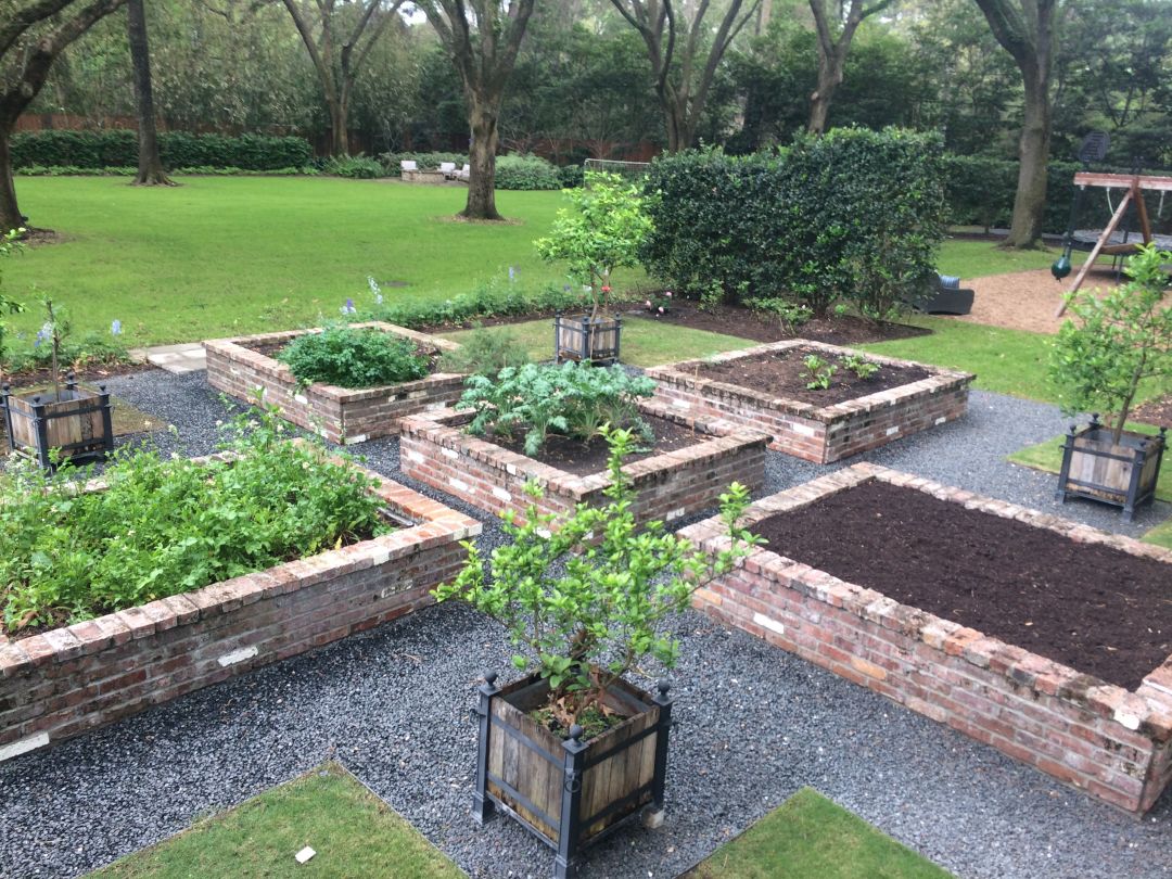 A stylish vegetable garden designed in square shapes.