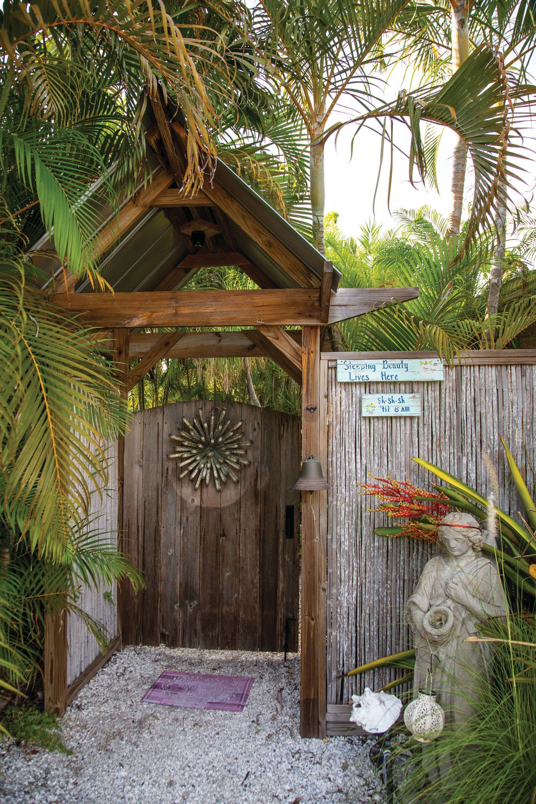 Homes have personality, evident in this handmade sign and entrance.