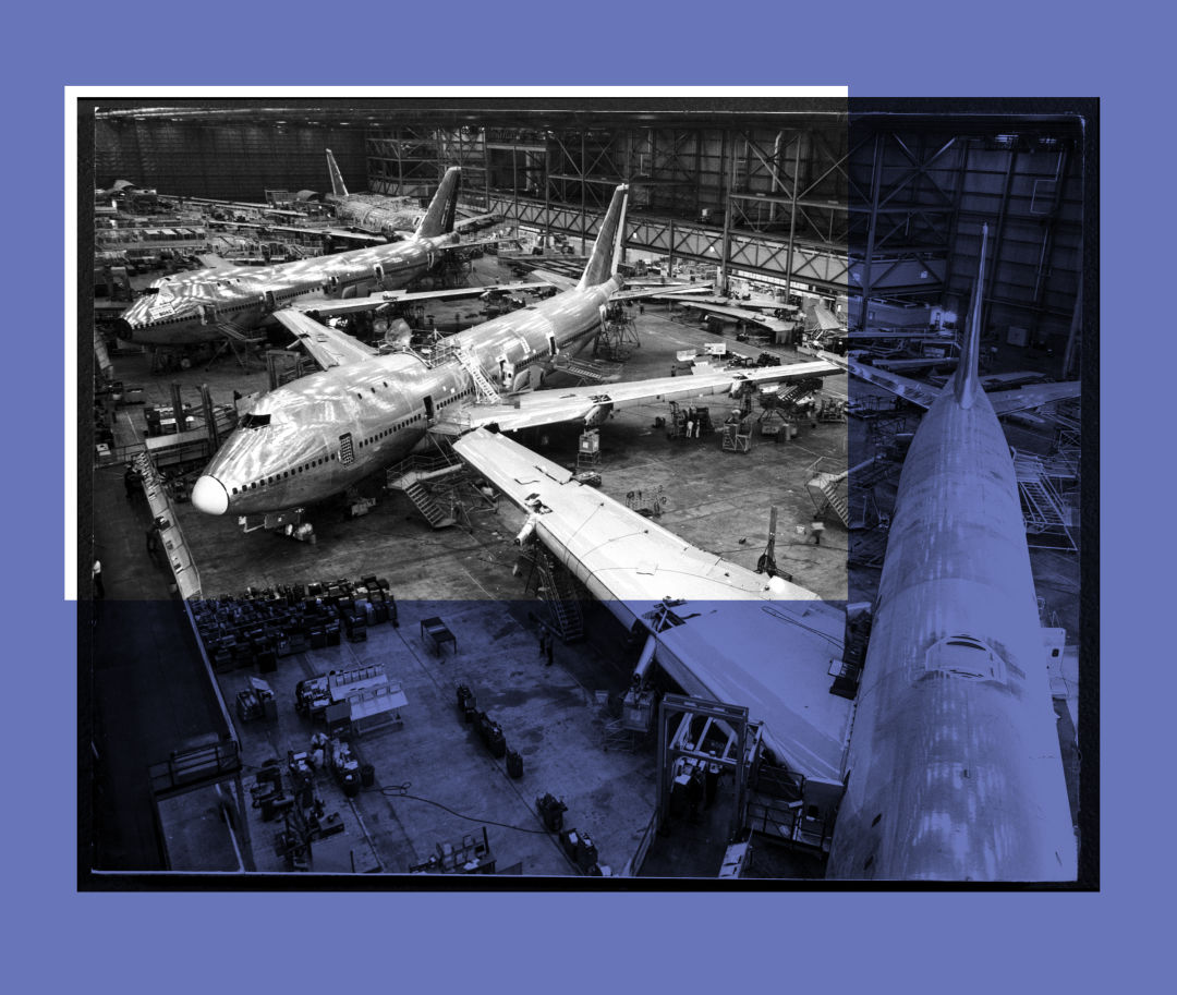 Four Boeing 747s in production at a plant in Everett, Washington