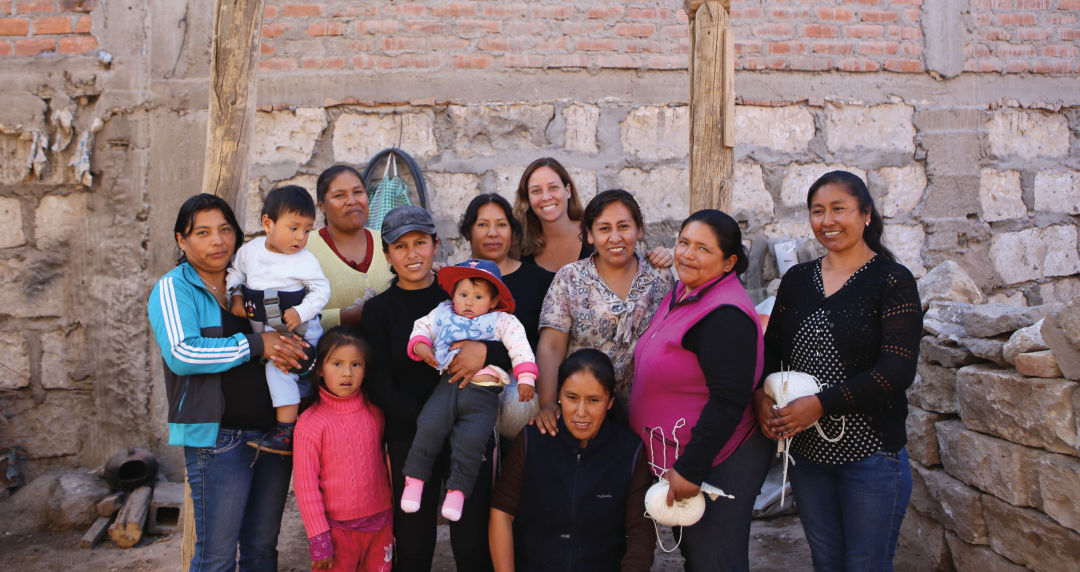 Sien + Co founder Alex Gibson pictured with the women she works with in Peru