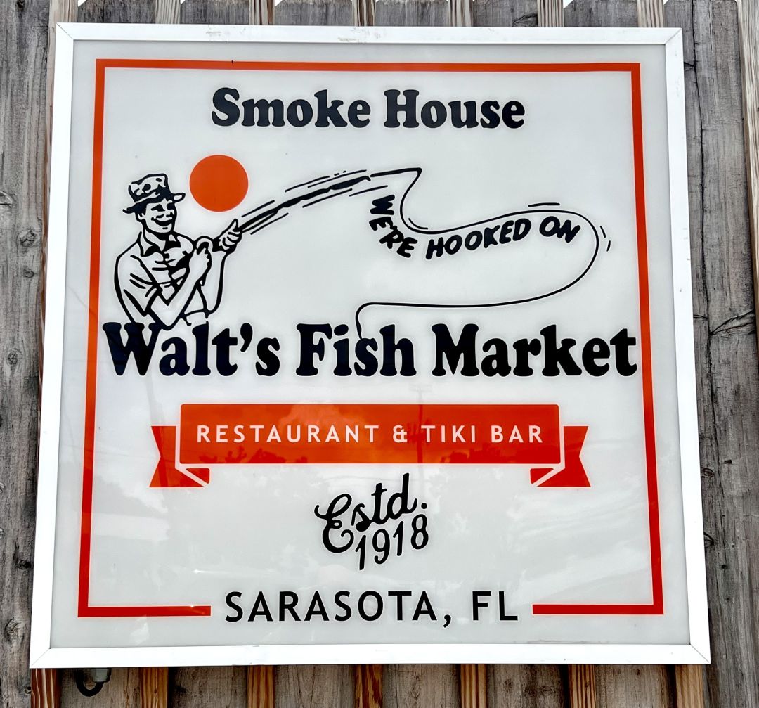 Walt's Fish Market Restaurant sign.