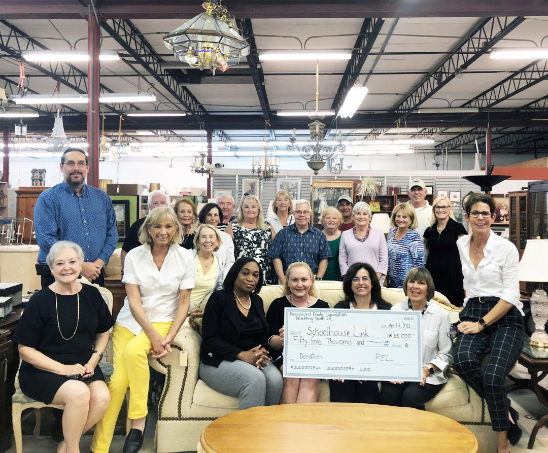 Representatives from PEL and Safe Children Coalition in attendance for the check presentation.