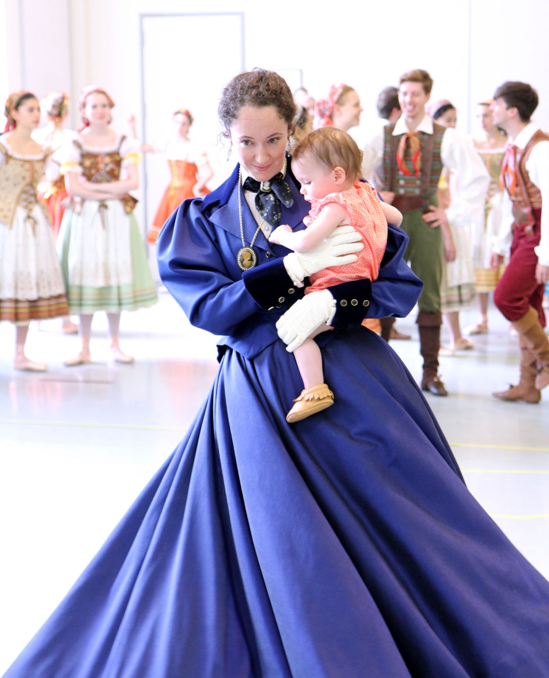 Sarah Orza holds Lola a year later, during a costume rehearsal of Giselle.