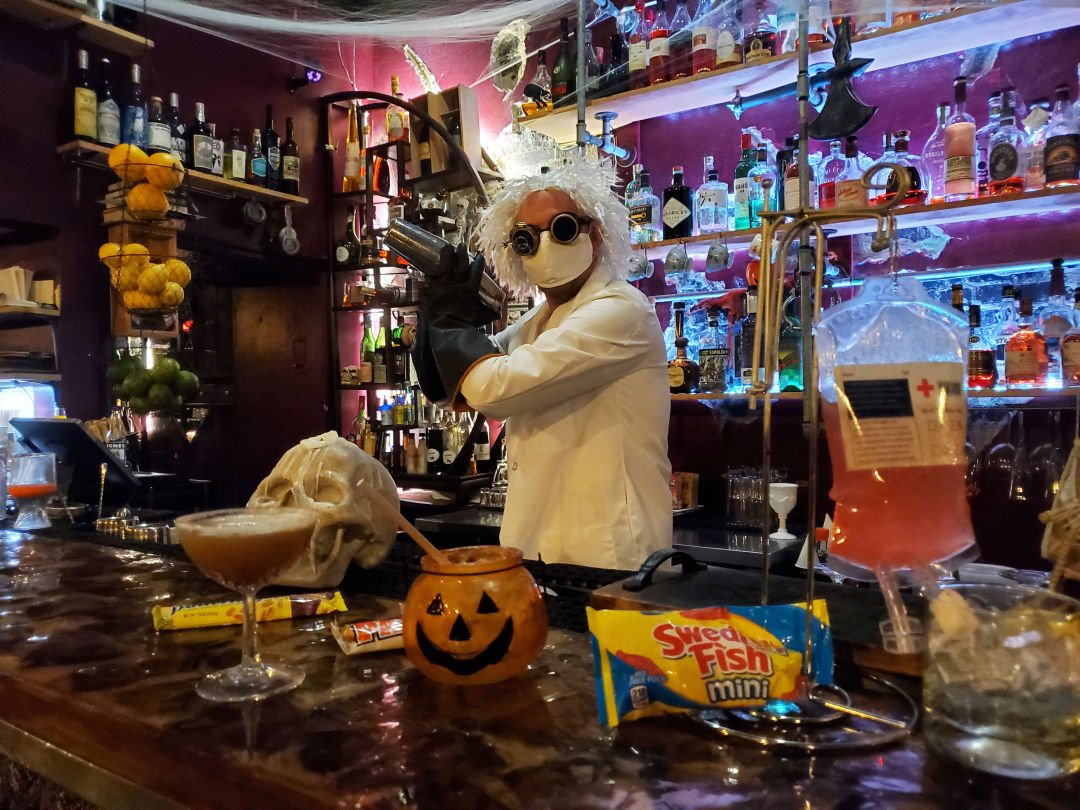 Panega Alchemy Lab owner Brad Coburn with his Halloween cocktail creations.