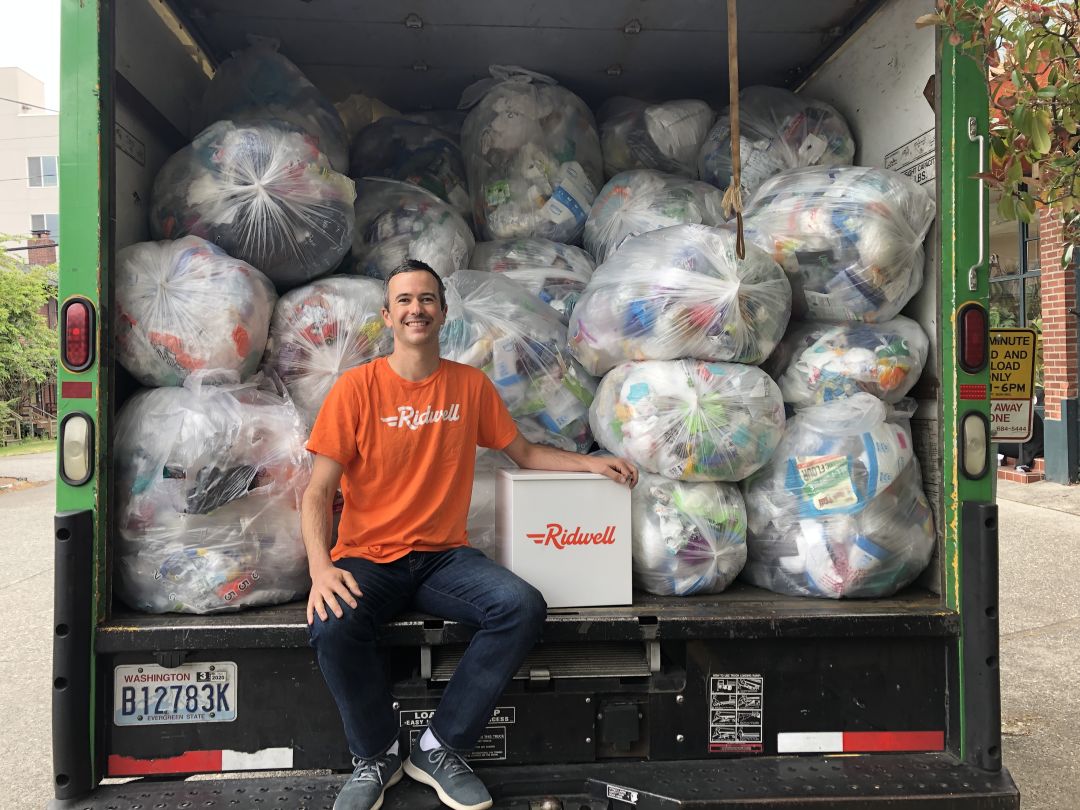 Ridwell cofounder and CEO Ryan Metzger in a truck