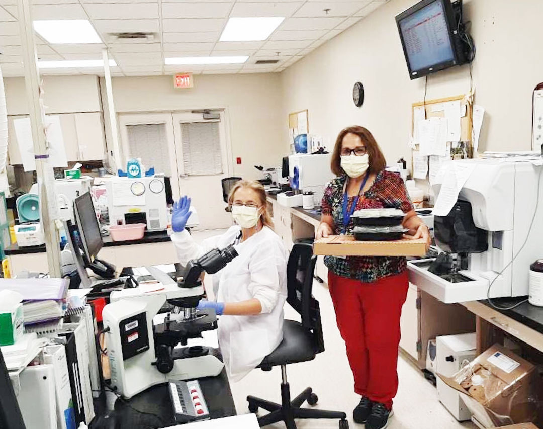 Health care workers receive meals as part of The DeMarcay's First Responder Friday program.