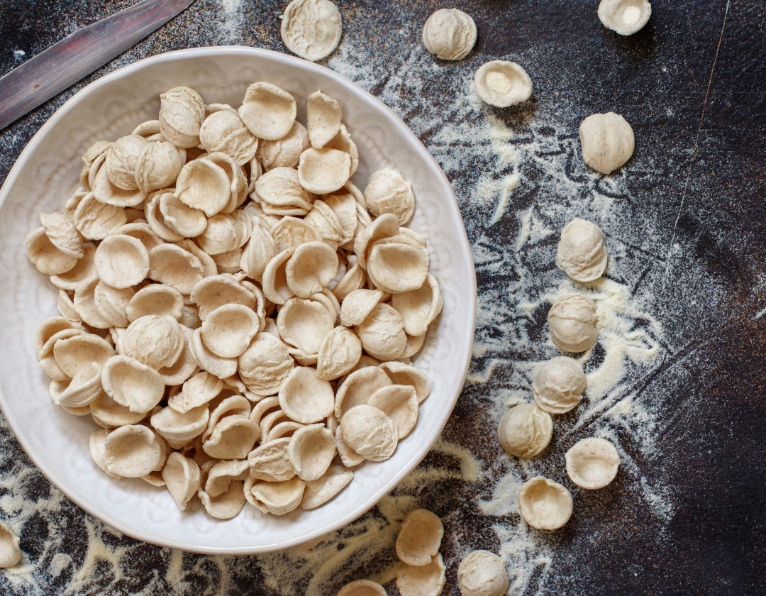 Puglia is known for its orecchiette pasta, which translates to "little ears."