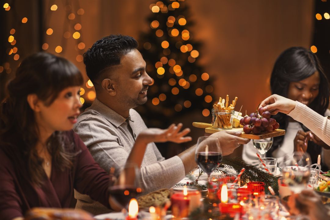 People talk at holiday dinner.