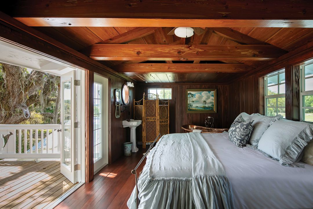 The second-floor bedroom overlooks the Myakka River.