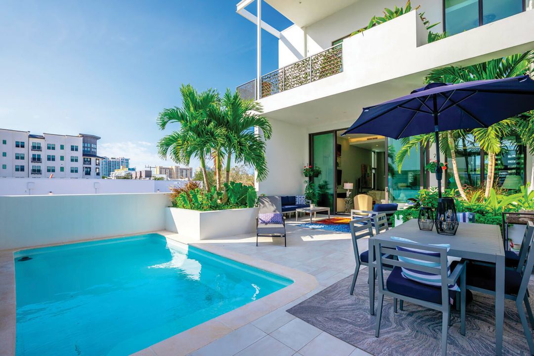 This private plunge pool and lounge area at Zahrada is an urban oasis overlooking downtown Sarasota.