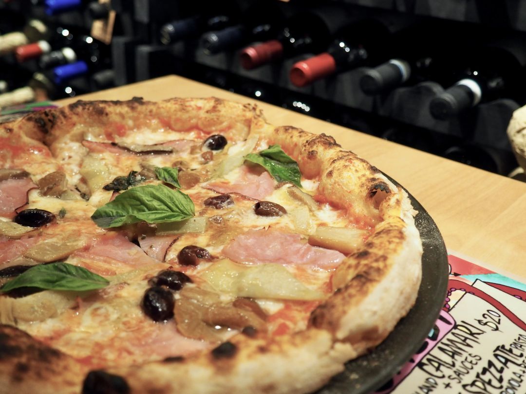 Pizza is made with imported flour at Malmosto.