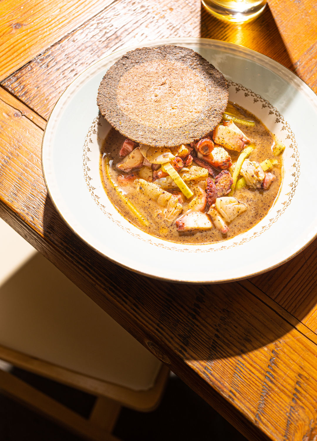 Octopus and shrimp aguachile with a hand-ground corn tortilla.
