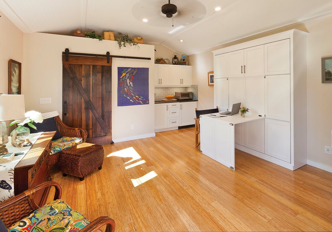 Once folded, the Murphy bed serves as a table.