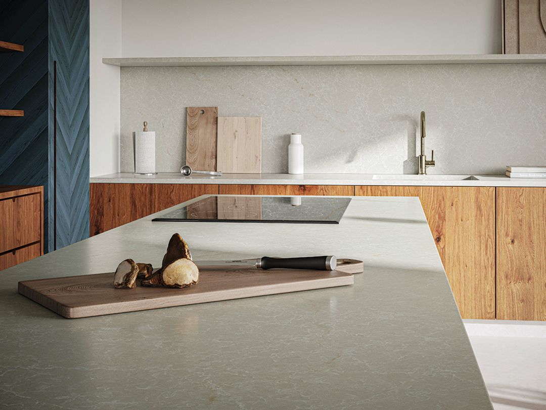 Caesarstone Mineral’s Brillianza is frosty white over a cool gray base with a powder-peach accent