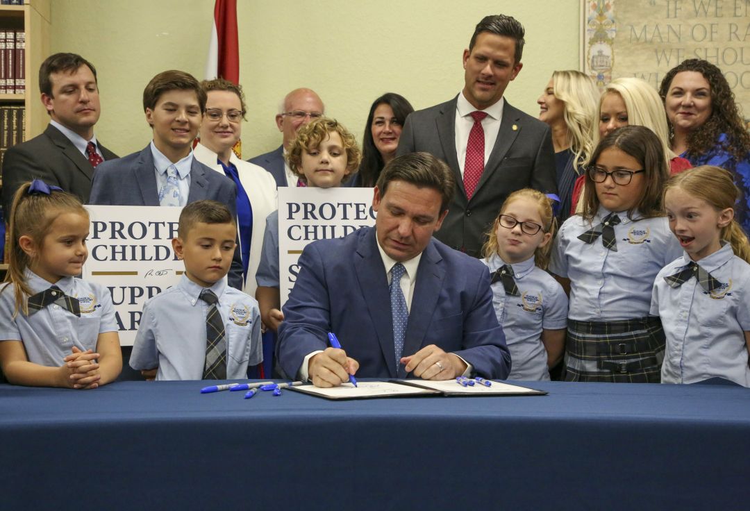 Gov. Ron DeSantis signs the Parental Rights in Education bill—aka the "Don't Say Gay" bill—into law on Monday, March 28.