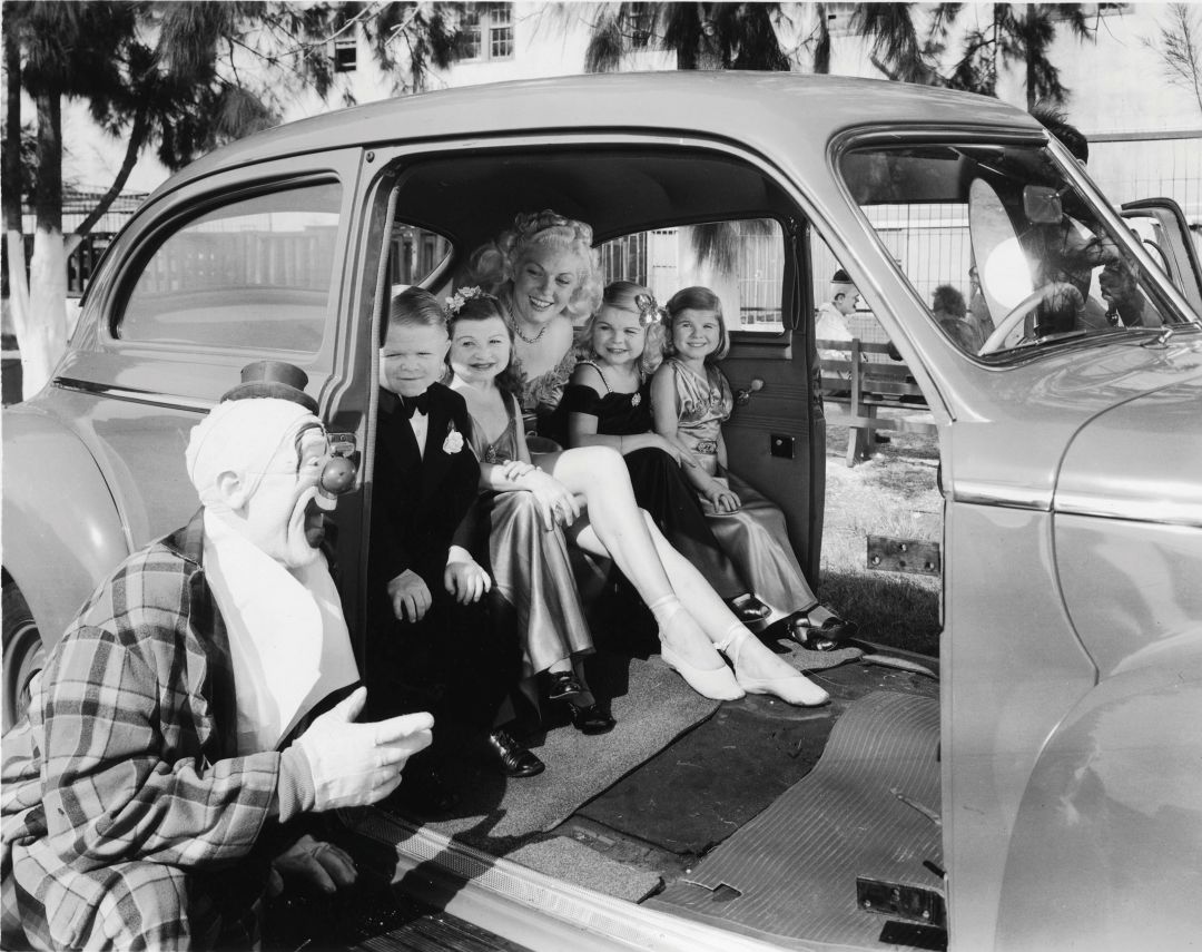 The Doll siblings with Ringling Brothers clown Lou Jacobs and an unidentified woman.