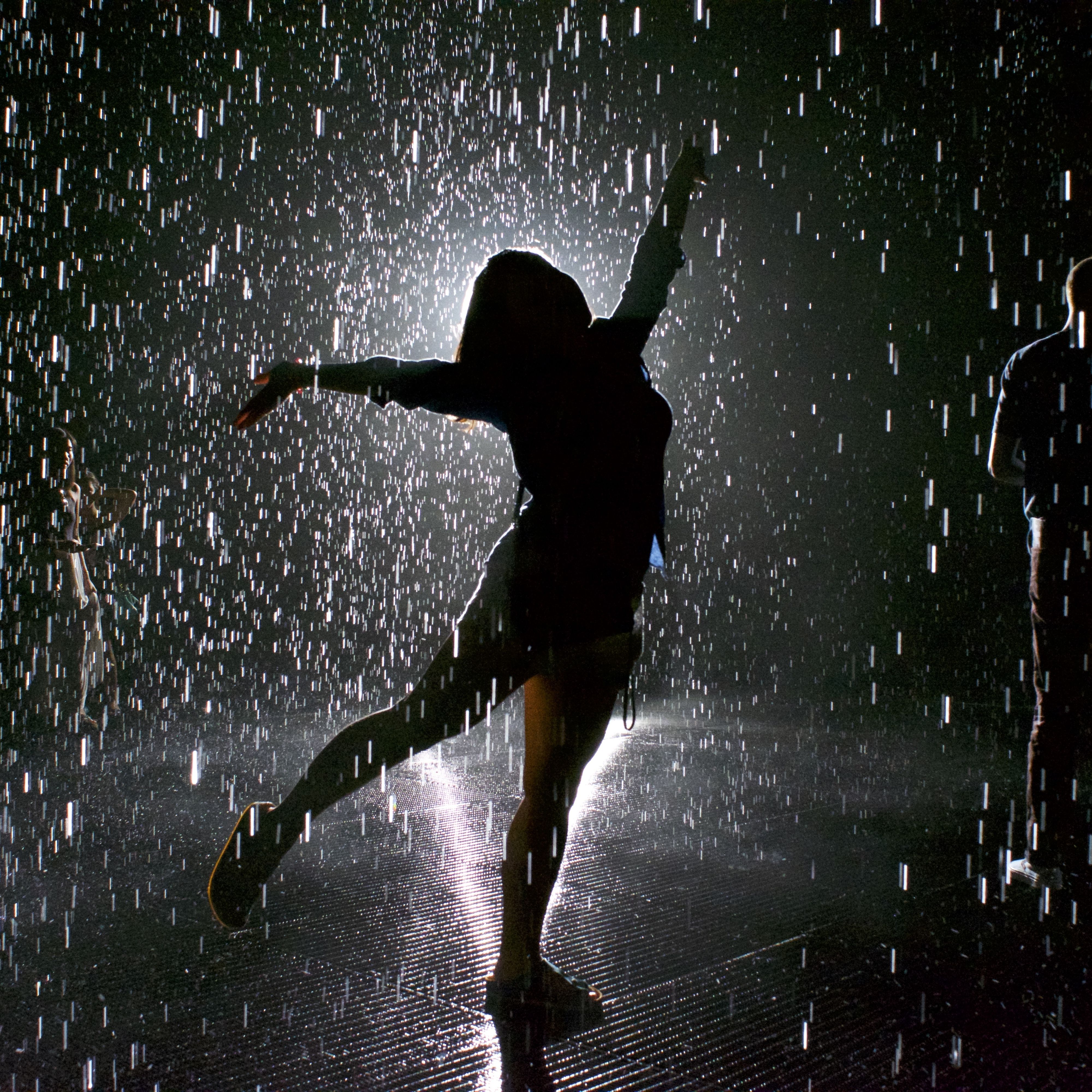 Silhouette dancing in the rain