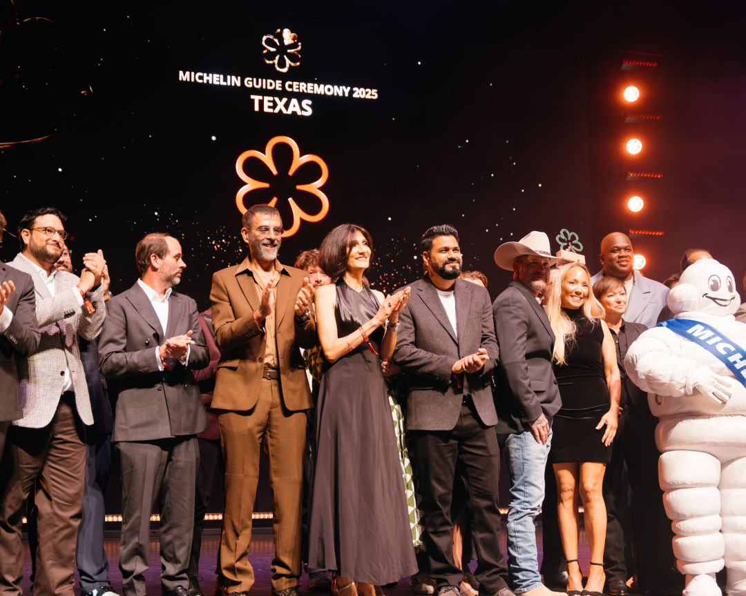 Texas honorees stand on stage at the Michelin Guide ceremony in Houston.