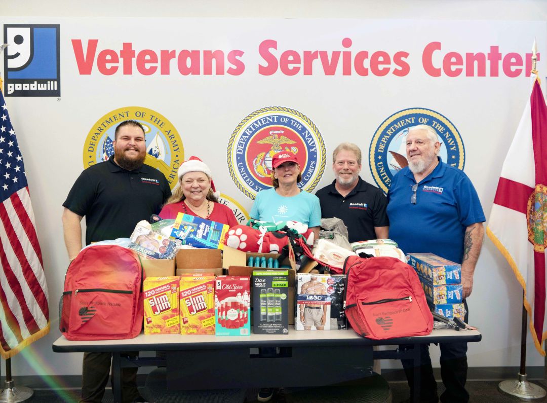 Present during the donation of backpacks for homeless veterans were (from l-r) Veterans Services program manager Todd Hughes, DAR members Rebecca Morgan and Jeanne McMillan, Veterans Service team member Randy Wright, and volunteer Richard Burger