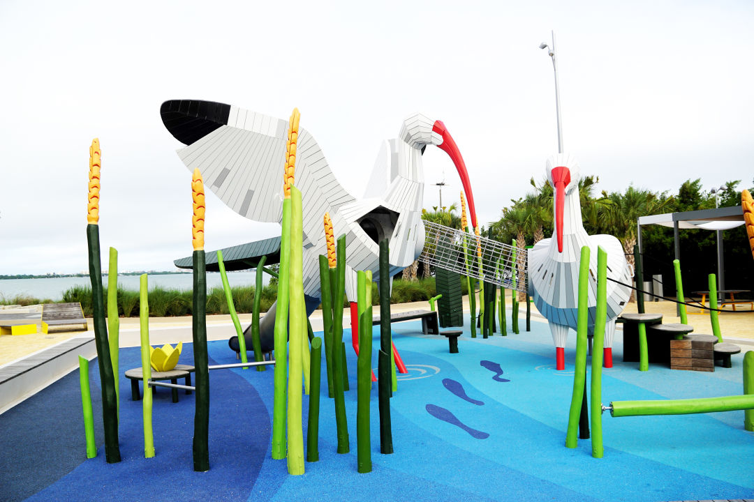 A whimsical playground maintains the park’s theme of environmental resilience.