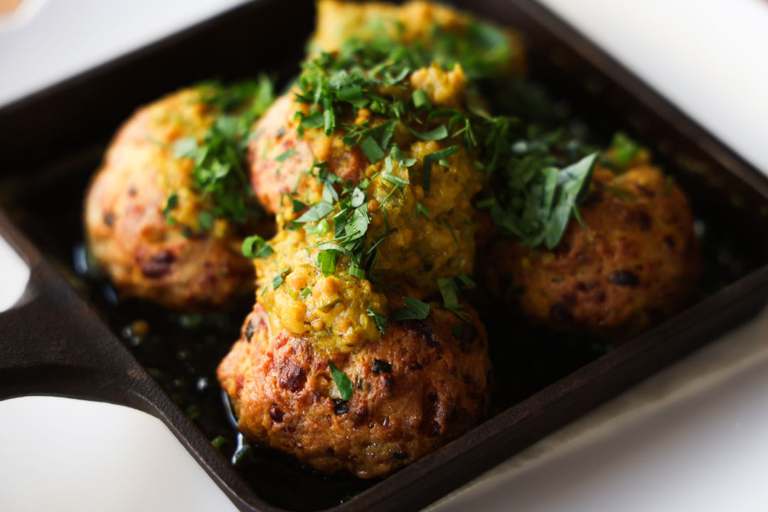 Pimento-chive drop biscuits are enrobed in pickle butter