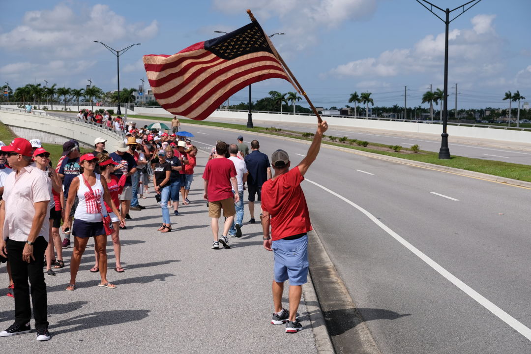 Trump supporters line up at Nathan Benderson Park on Tuesday afternoon.