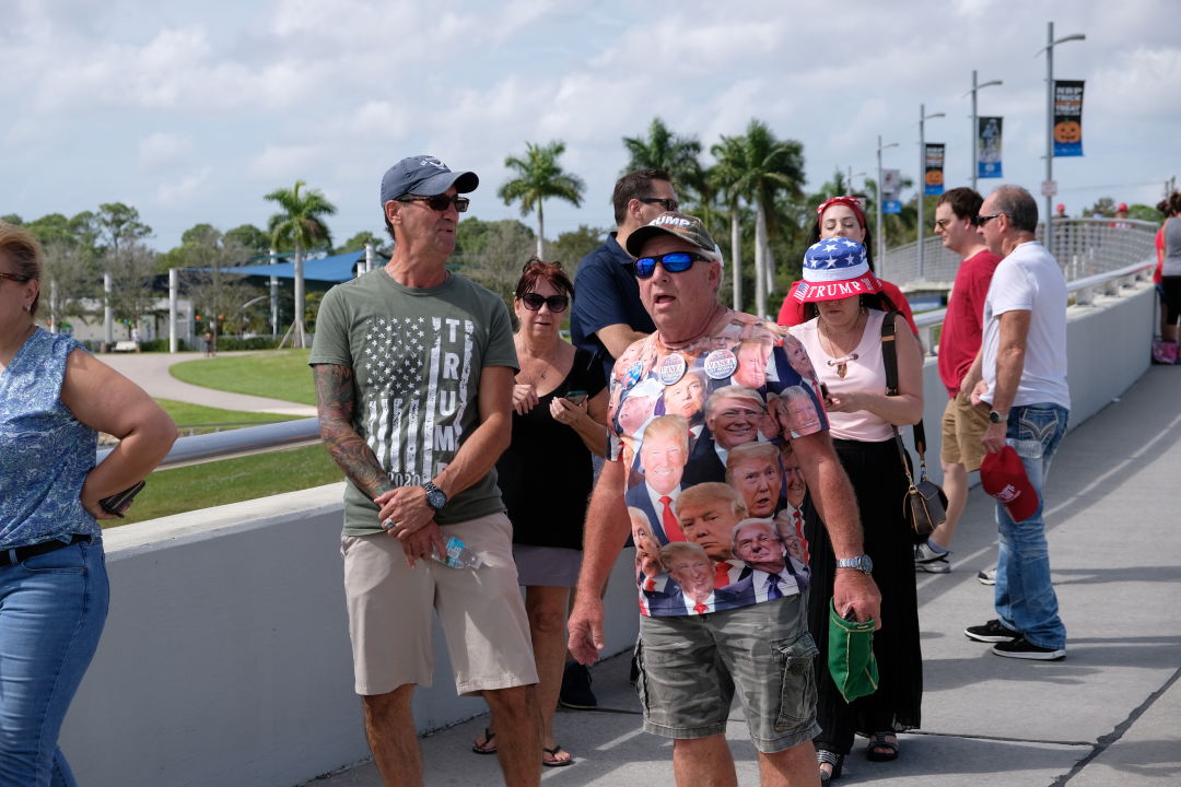 Supporters dressed in Trump paraphernalia.