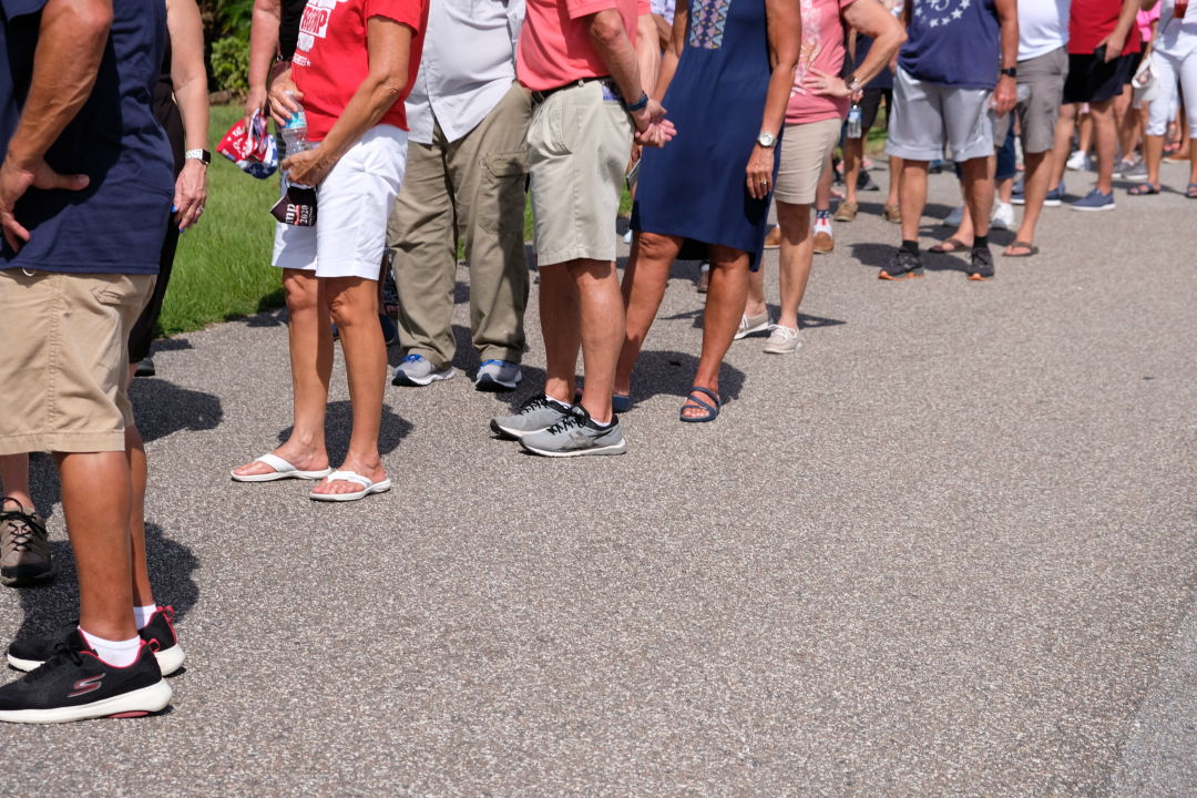 People stood in the unforgiving heat for several hours