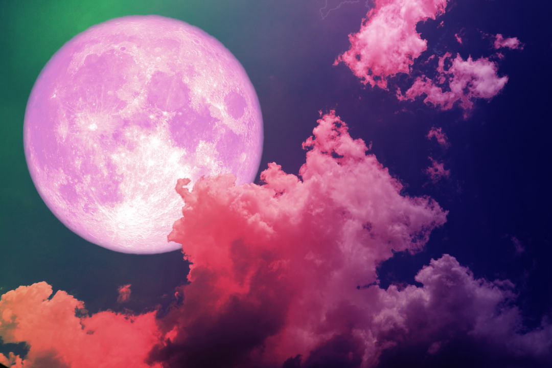 Immerse yourself in the enchanting splendor of the Super Pink Moon