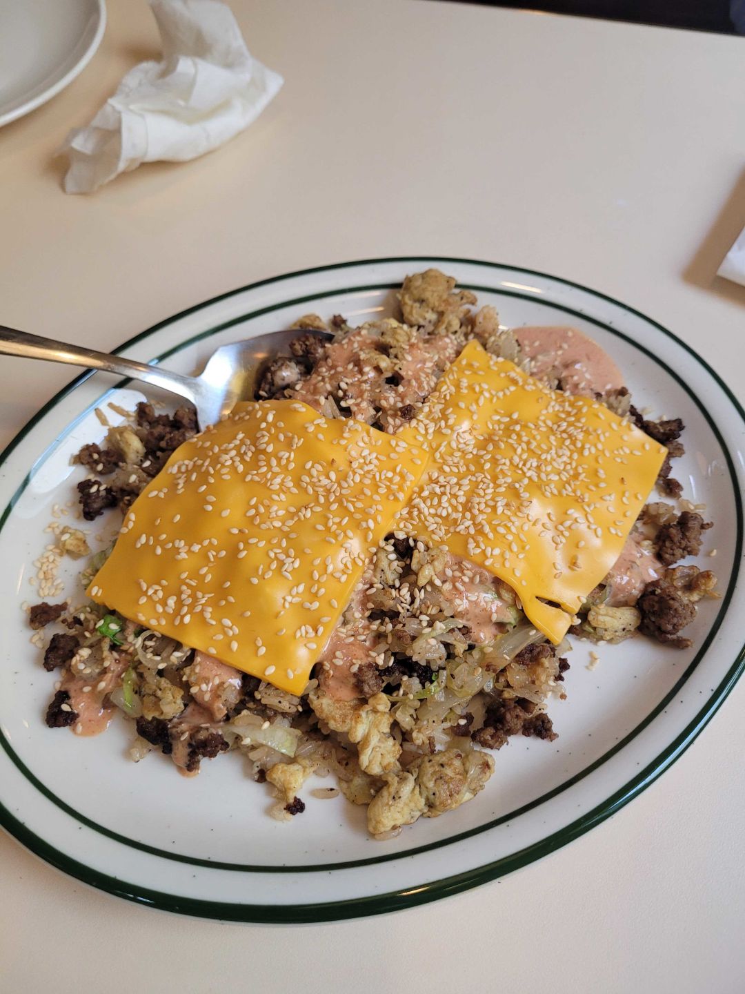 A plate of cheeseburger fried rice from Agnes and Sherman.