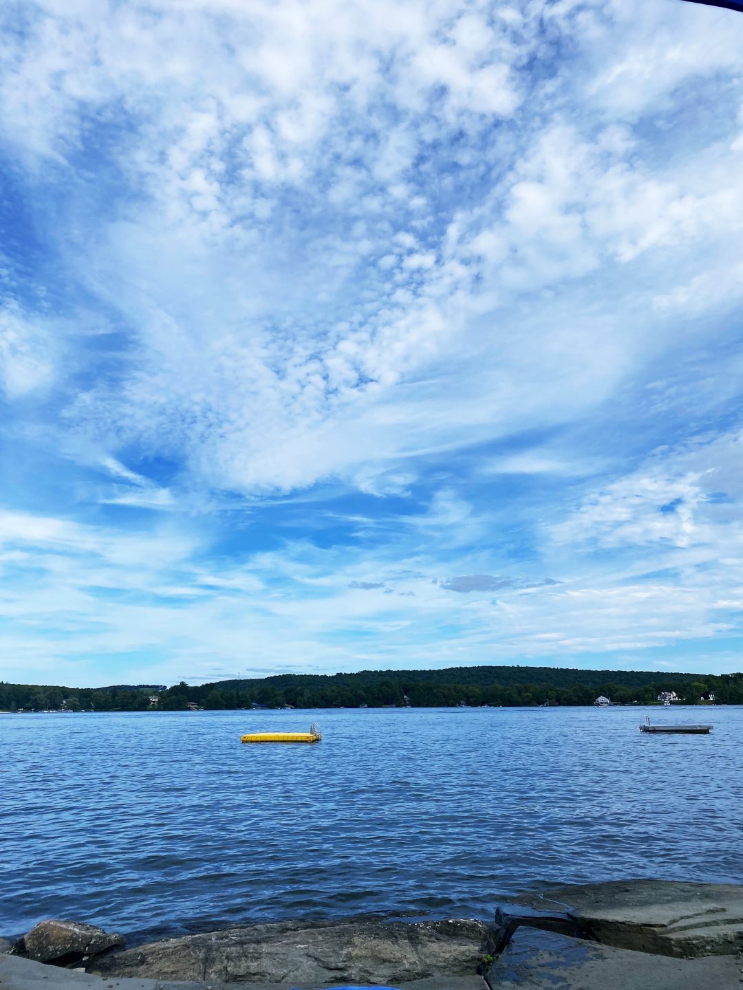 A joyful summer activity: swimming to the floating dock in chilly, spring-fed, crystal-clear lake water