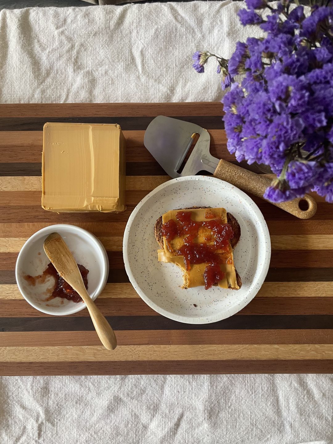 Brown cheese with jam makes for an excellent breakfast.