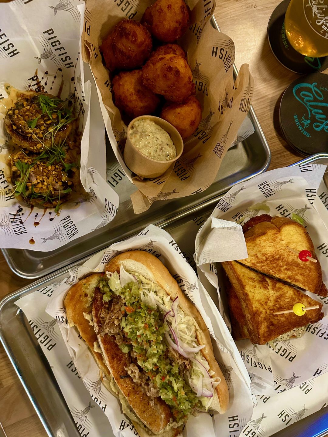 Chicken katsu sandwich (bottom right) and other offerings at PigFish.