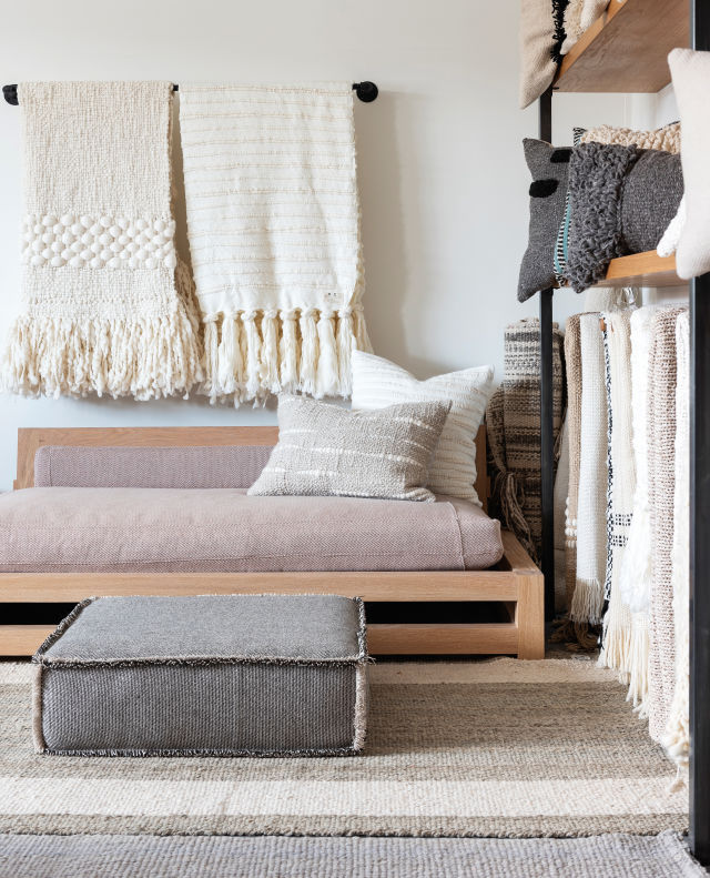 Handwoven throws, pillows, and floor cushions are among Sien + Co’s offerings.