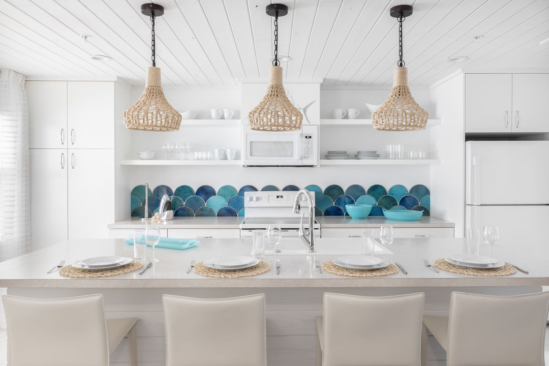 Last year, Orange Moon Interiors' lead designer Kelley Kaiser turned the four Sailfish Beach Resort bungalows on Anna Maria Island into spaces full of coastal whimsy.