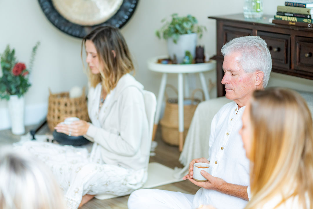 Participants set an intention before drinking the cacao.