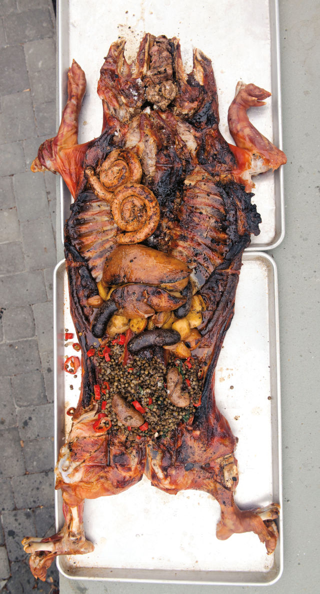 1017 savor whole roasted pig ktgltu
