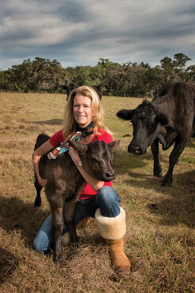 Moore with one of her calves