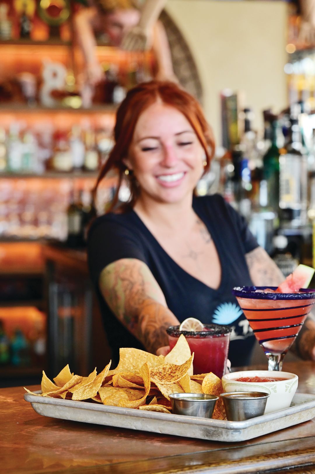 Chips with a trio of salsas and two of Rocco’s 11 specialty margaritas.