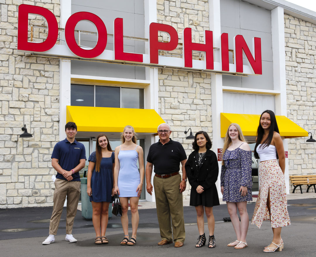 From left to right: Dylan Suzuki, Sarasota High School; Alexis Evans, Venice High School; Christina Harding, Riverview High School; Dolphin Aviation owner Ron Ciaravella; Isabella Zaccone, Booker High School; Madelyn Kona, Venice High School; and Thy Le, Sarasota High School.