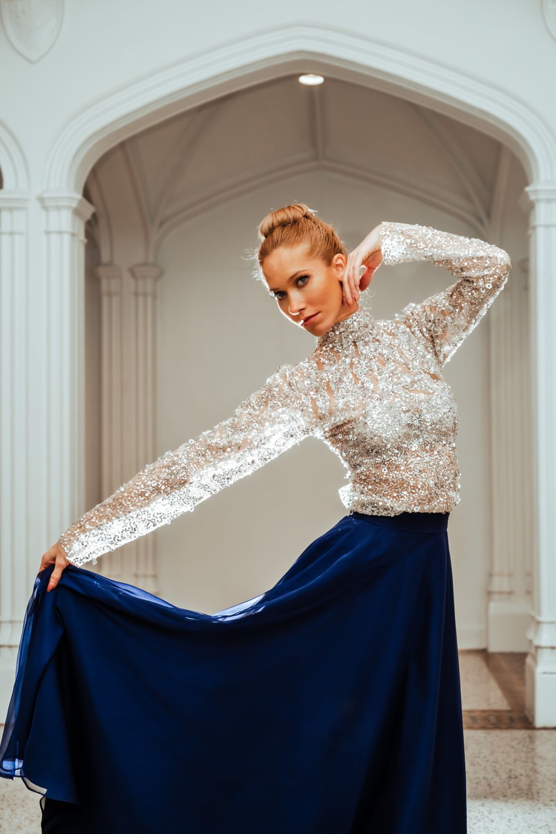 A Sarasota ballet dancer models Fovari's sparkly top and navy skirt.